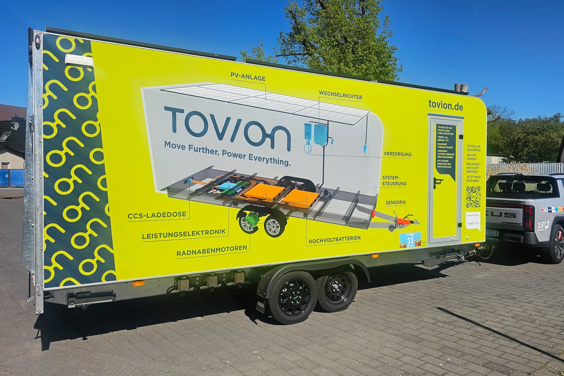 Tovion unveils passenger trailer with integrated electric drive